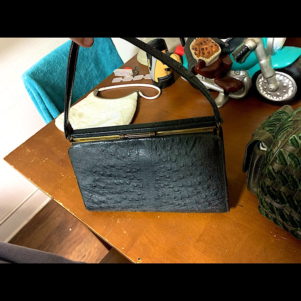 Mid 1960s prada bag black ostrich leather it’s a fine of a well kept antique